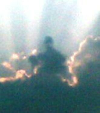 figure in the clouds