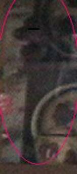 little girl in black dress china cabinet ghost