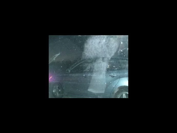 Is this an angel image in the car window?