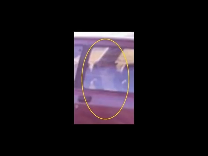 Close-up of the ghost car reveals what looks like a figure in the driver's seat, or is it reflection?