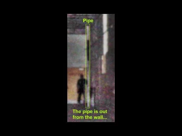 We circled the pipe to show how it runs in front of the shadow man.