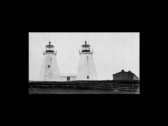 Old photo of the twin towers of Plymouth Lighthouse that once stood