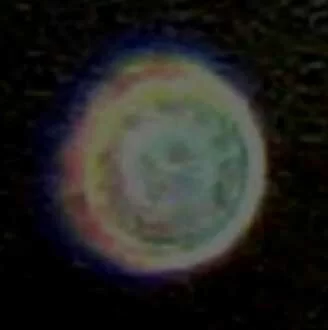 Do you see the smiling face found within each of Kathy's orb photos?