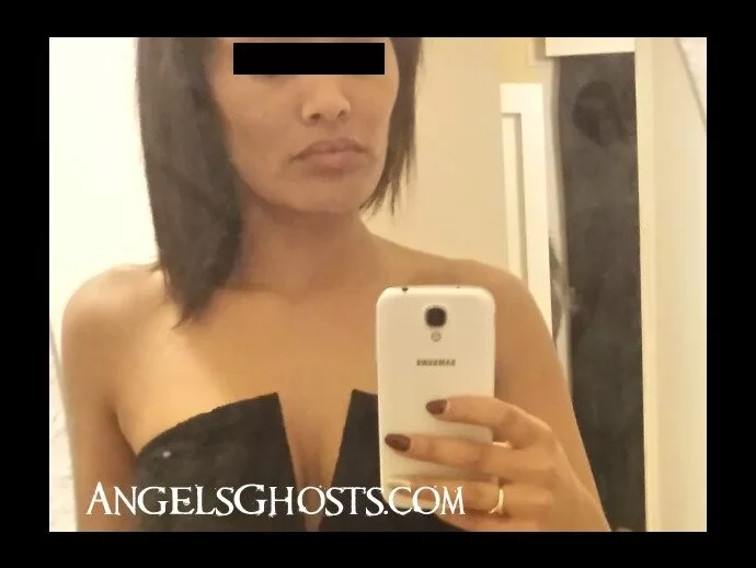 A peering figure seems to be in the background.
